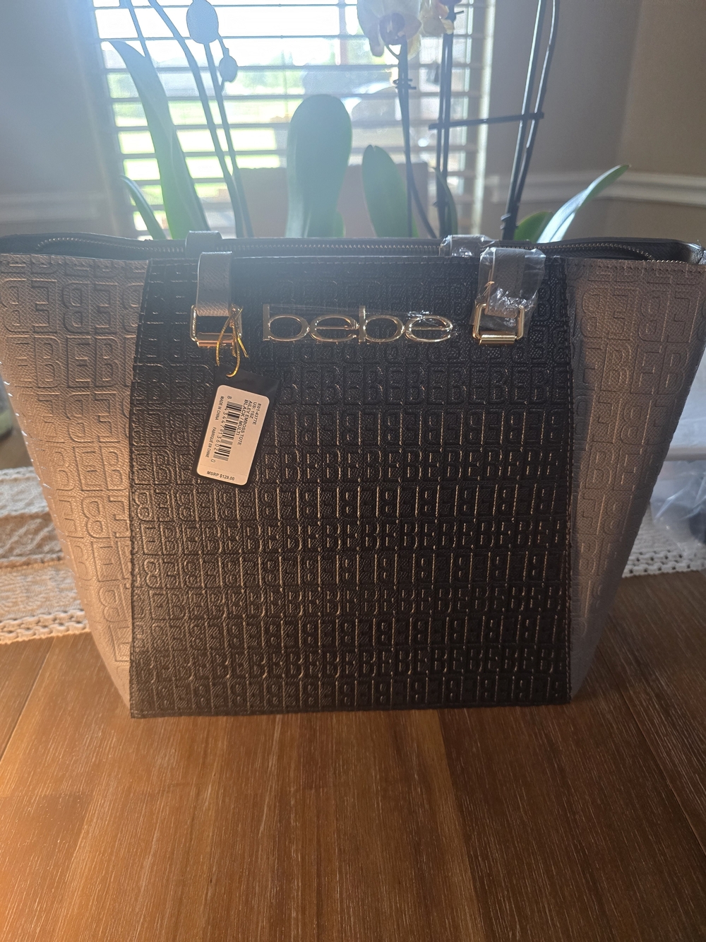 bebe Ailey Emboss Two-Tone Logo Tote in Black and Gray with Gold Hardware
